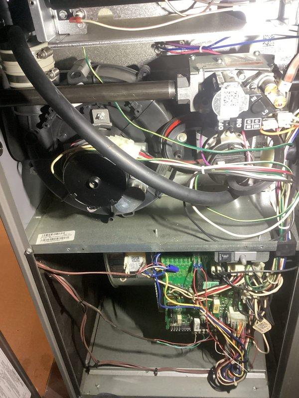 Completed comprehensive ComfortGuard maintenance inspection on residential HVAC system. Performed thorough examination of furnace internal components including control board, electrical connections, and motor assembly; verified all wire harnesses and safety controls functioning properly. Confirmed thermostat operation with system responding correctly to temperature setpoint commands in heating mode.