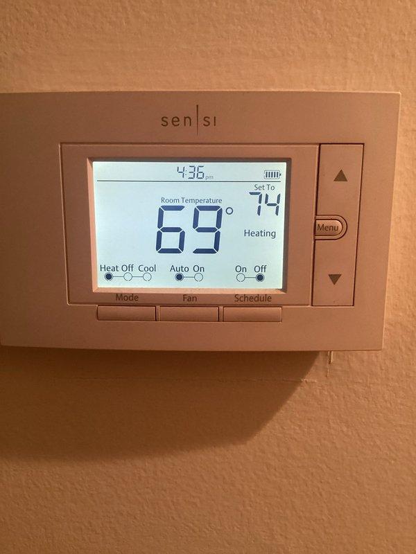 Completed comprehensive ComfortGuard maintenance inspection on residential HVAC system. Performed thorough examination of furnace internal components including control board, electrical connections, and motor assembly; verified all wire harnesses and safety controls functioning properly. Confirmed thermostat operation with system responding correctly to temperature setpoint commands in heating mode.