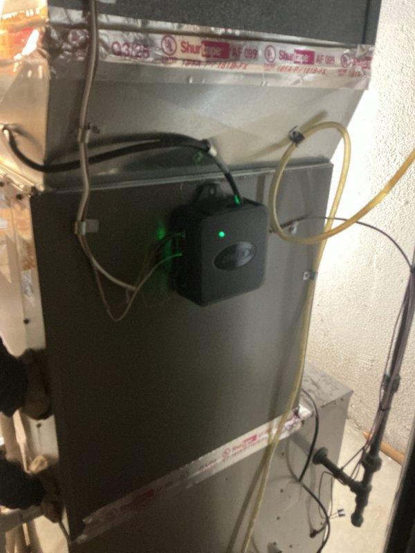 Completed installation of 2.5 ton air conditioning system with evaporator coil in rear-discharge configuration. Mounted new air handler unit in residential utility space with integrated electronic control module and LED diagnostics. Established dedicated electrical circuits at main panel for new HVAC equipment, completed all refrigerant line connections, and verified proper system operation upon startup.