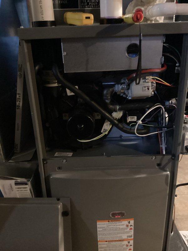 Completed annual furnace maintenance and tune-up on residential heating system per maintenance membership agreement. System found operating properly with no issues present. Performed comprehensive inspection of all internal components including inducer motor assembly, blower motor, electrical connections, gas valve, heat exchanger, and control board. Verified proper operation of all safety controls and limit switches. Cleaned and inspected burner assembly, checked gas pressure and combustion parameters. Tested thermostat operation and confirmed proper heating cycle sequence. All components functioning within manufacturer specifications. Unit left in proper working condition.