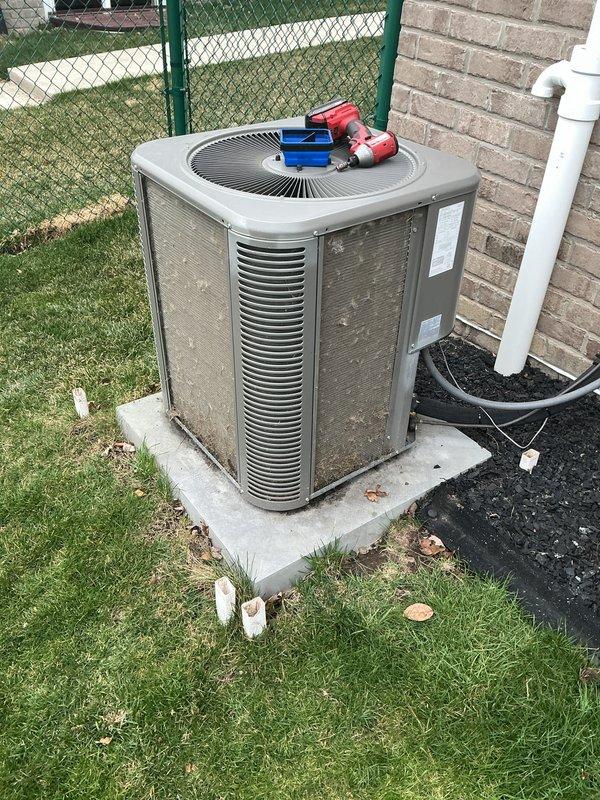 Completed routine annual maintenance on a 10-year-old residential central air conditioning system. Performed comprehensive AC tune-up including inspection of outdoor condenser unit, verified proper operation of compressor and condenser fan motor, checked refrigerant pressures and temperatures, cleaned condenser coils, inspected electrical connections and contactors, and verified proper condensate drainage through PVC discharge line. System operating within normal parameters with no deficiencies noted at time of service.
