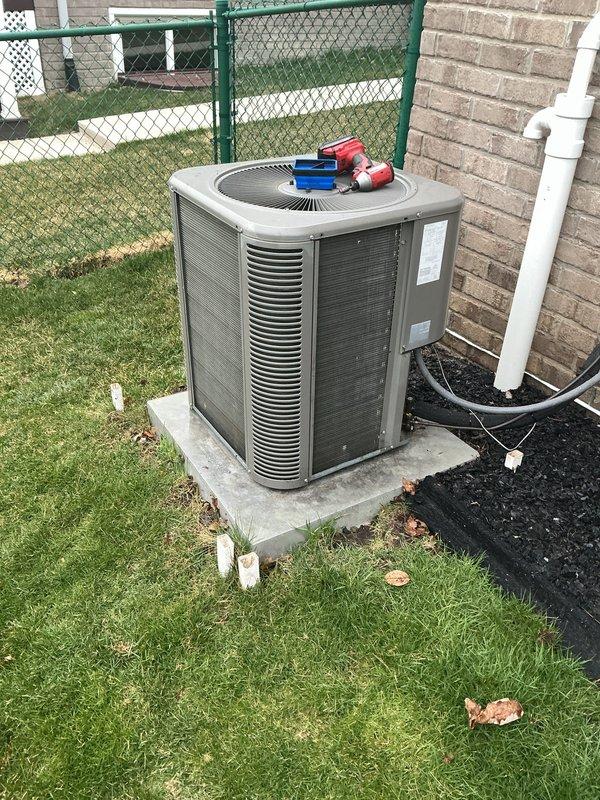 Completed routine annual maintenance on a 10-year-old residential central air conditioning system. Performed comprehensive AC tune-up including inspection of outdoor condenser unit, verified proper operation of compressor and condenser fan motor, checked refrigerant pressures and temperatures, cleaned condenser coils, inspected electrical connections and contactors, and verified proper condensate drainage through PVC discharge line. System operating within normal parameters with no deficiencies noted at time of service.