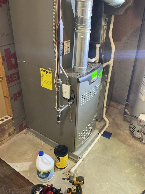 Completed routine spring air conditioning maintenance on a 10-year-old residential AC system. Performed comprehensive tune-up including inspection of indoor furnace unit, tested system pressures and temperatures using digital manifold gauges, and verified proper refrigerant levels and operating parameters. System found to be functioning properly with no deficiencies noted.