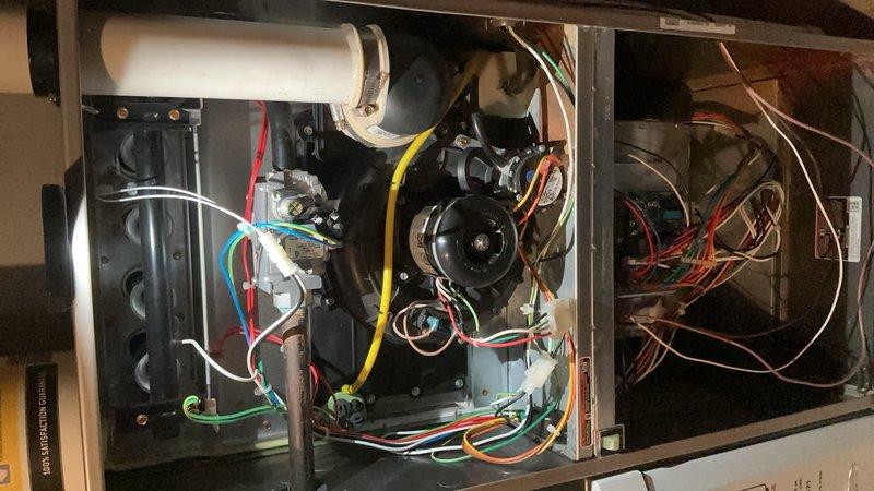 Completed routine preventative maintenance on a five-year-old residential central air conditioning system. Performed comprehensive system inspection including examination of blower motor assembly, electrical connections, and control board components. Verified all wire connections were secure with proper color-coded terminations at motor terminals and control board. Inspected capacitor mounting and electrical components for signs of wear or deterioration. Checked blower motor operation and verified proper function of all safety controls and ignition systems. Examined air handler cabinet interior, confirming all mechanical and electrical components were properly secured and operational. System tested and found to be operating within normal parameters with no issues identified.