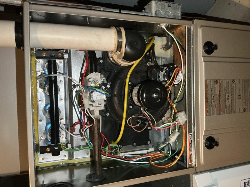 Completed routine preventative maintenance on a five-year-old residential central air conditioning system. Performed comprehensive system inspection including examination of blower motor assembly, electrical connections, and control board components. Verified all wire connections were secure with proper color-coded terminations at motor terminals and control board. Inspected capacitor mounting and electrical components for signs of wear or deterioration. Checked blower motor operation and verified proper function of all safety controls and ignition systems. Examined air handler cabinet interior, confirming all mechanical and electrical components were properly secured and operational. System tested and found to be operating within normal parameters with no issues identified.
