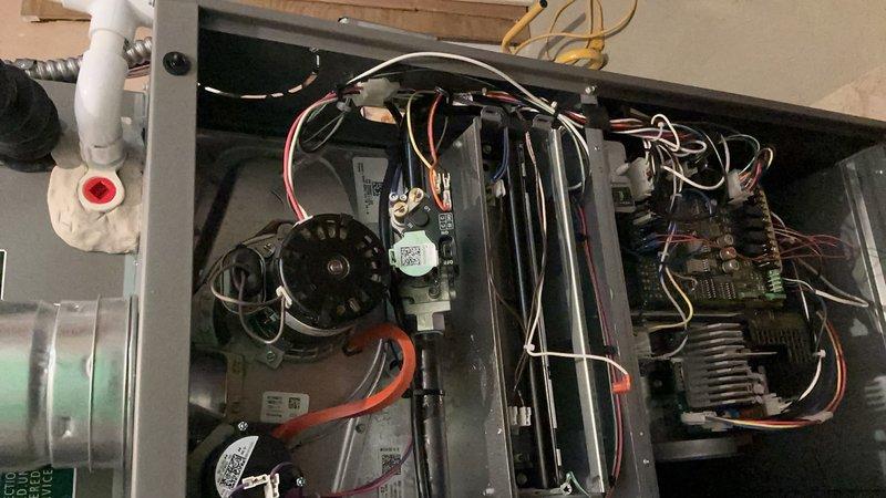 Performed comprehensive preventive maintenance on residential HVAC system including both air conditioning unit and forced air furnace, approximately 10 months in service. Conducted complete AC tune-up including inspection of blower motor assembly, inducer fan operation, and electrical connections. Verified proper function of gas valve assembly and heat exchanger tubes. Inspected control board terminals and all wiring harnesses for secure connections and proper voltage. Tested all safety controls and limit switches. Cleaned and inspected burner assembly components. Verified proper airflow and checked refrigerant levels on cooling system. All components operating within manufacturer specifications with no deficiencies noted. System performing efficiently as part of routine membership maintenance program.