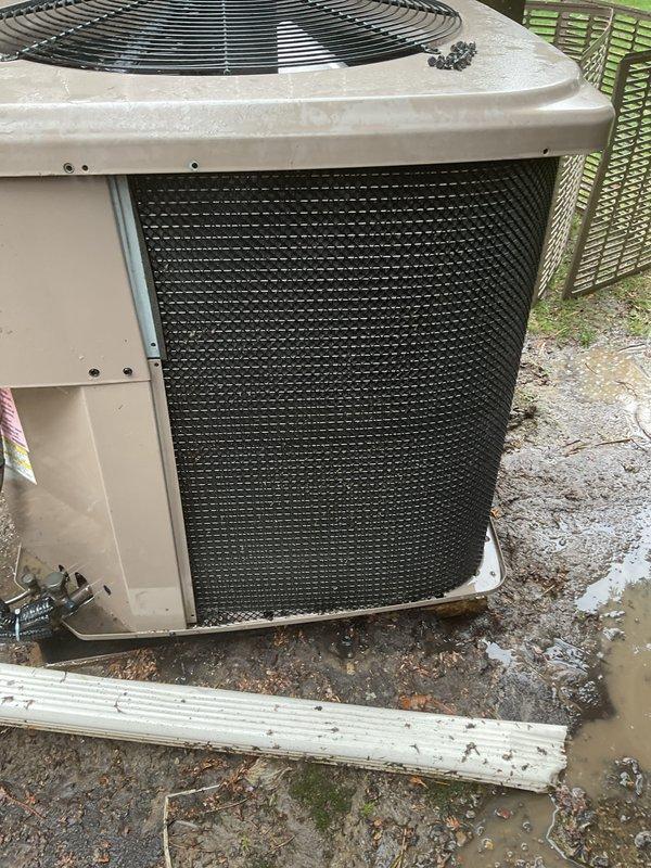 Completed annual air conditioning maintenance on outdoor condensing unit. Upon arrival, found condenser coil heavily soiled with accumulated dirt, leaves, and organic debris significantly restricting airflow. Removed access panel, cleaned exterior cabinet, removed debris from fan grille, and thoroughly cleaned condenser coil to restore proper airflow and system efficiency. Unit tested and operating within normal parameters upon completion.