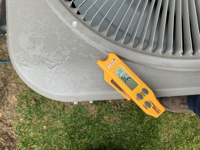 Completed annual cooling maintenance on outdoor condensing unit. Performed comprehensive system inspection, measured operating temperatures and pressures, cleaned condenser coil fins of accumulated debris and dust, verified proper airflow through top discharge grille, and confirmed electrical disconnect functionality. Unit operating within normal parameters upon completion of preventive maintenance service.