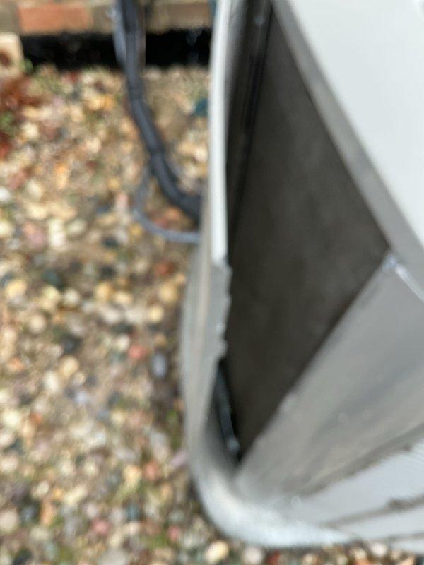 Completed routine air conditioning maintenance on outdoor condenser unit as part of recurring Air Care Cooling service program. Inspected evaporator coil, condenser unit, refrigerant lines, and electrical connections; documented equipment condition with photographs showing minor dust accumulation on coil fins but overall satisfactory operating condition.