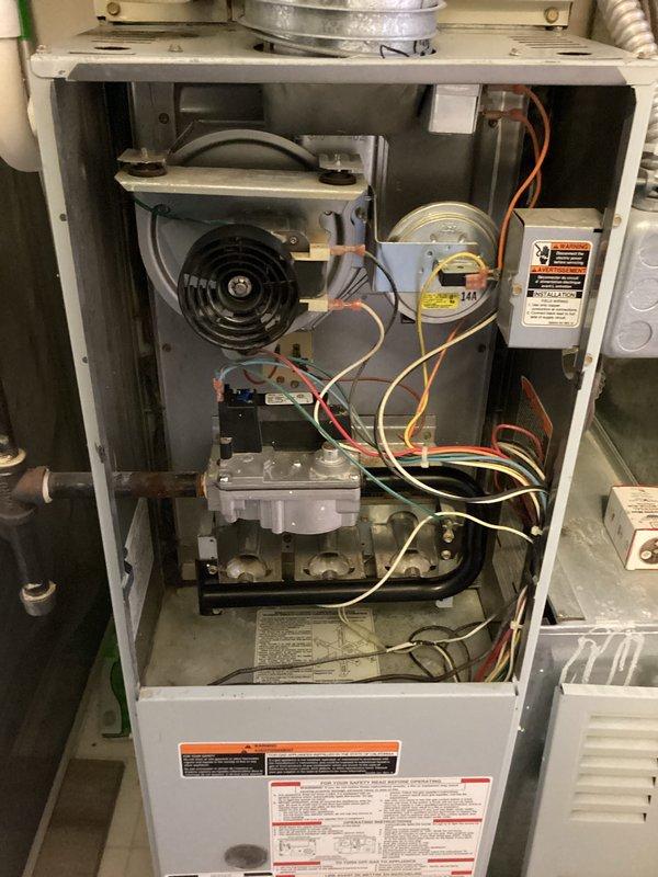 Completed comprehensive annual heating and cooling maintenance on Bryant furnace system. Performed thorough inspection of all internal components including blower motor assembly, gas valve, control board, and electrical connections. Replaced 20x24x1 air filter and conducted diagnostic testing of all mechanical and electrical systems. Verified proper operation of gas valve assembly, checked all wire connections for secure contact, and confirmed blower motor function. All components found to be in good working condition with no visible signs of deterioration or damage. System operating within normal parameters upon completion of maintenance procedures.