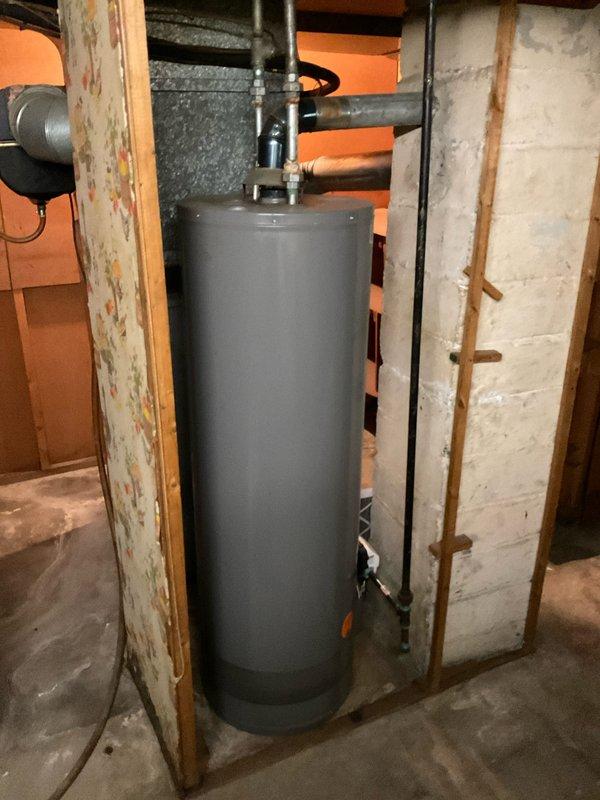 Provided comprehensive estimate for replacement of 34-year-old natural gas furnace and air conditioning system located in basement under buy-one-get-one promotion. Assessed existing equipment configuration, electrical service panel, and installation requirements including ductwork connections and utility access. Current system operational but recommended replacement due to age and efficiency considerations.