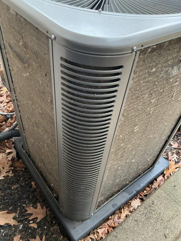 Completed annual maintenance on 15-year-old forced air heating and air conditioning systems. Performed comprehensive AC tune-up including pressure differential measurements using dual port manometer, inspected outdoor condenser unit with cylindrical housing and vertical louver vents, verified all electrical connections and components, and confirmed both heating and cooling systems are operating within normal parameters. All equipment tested and found to be functioning properly with no repairs required.