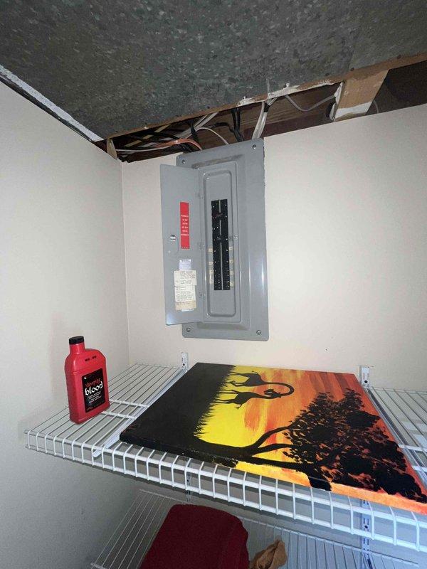 Conducted on-site assessment for air conditioning system replacement at residential property. Evaluated existing AC unit of unknown age, documented electrical panel location and accessibility in interior utility closet, and photographed installation area to determine equipment specifications and clearance requirements for new system installation. Provided comprehensive estimate for complete air conditioning unit replacement to be scheduled within requested timeframe.