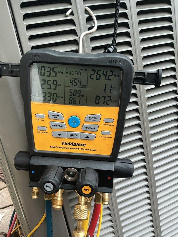 Completed annual maintenance and tune-up on residential central air conditioning system. Performed comprehensive inspection of outdoor condenser unit, checked refrigerant pressures and temperatures using digital manifold gauges, verified system operation and performance parameters. All readings within normal operating range, system functioning properly with no deficiencies noted at time of service.