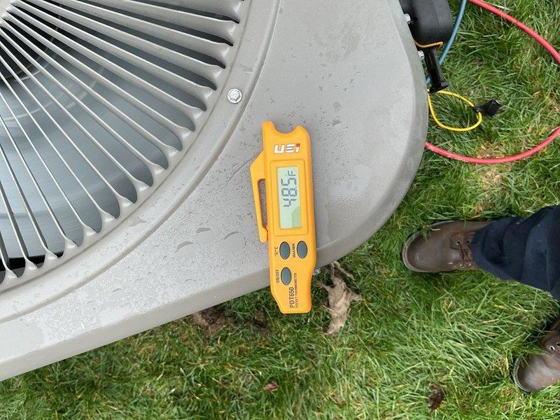 Performed scheduled air conditioning maintenance on residential condenser unit. Conducted system diagnostics using digital multimeter, measured operational parameters, and connected manifold gauge set to verify refrigerant pressures and system performance. Unit operating within normal specifications upon completion of preventive maintenance inspection.
