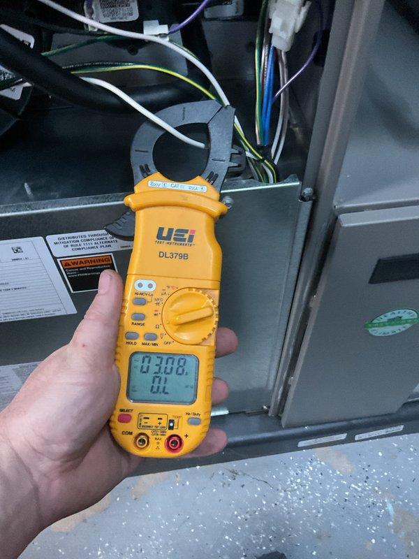 Completed comprehensive annual HVAC maintenance service including heating and cooling system inspections. Performed furnace filter replacement and conducted thorough evaluation of both heating and cooling equipment. Accessed internal components to inspect electrical connections, wiring integrity, and motor assemblies. Verified proper operation of all electrical connections including ground wiring and wire terminations with appropriate connectors. Utilized digital clamp meter to measure electrical current draw and confirm system is operating within manufacturer specifications. All components found to be in functional condition with no immediate repairs required. System tested and confirmed operational for continued reliable performance.