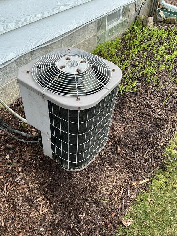 Completed annual cooling maintenance on residential split system. Performed comprehensive inspection of outdoor condensing unit, verified proper operation of all components, and documented equipment condition with photographs. No filter replacement required at this time.