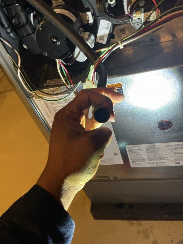 Completed comprehensive AC tune-up and preventive maintenance on a 5-year-old forced air heating and cooling system. Inspected and tested all major components including compressor, condenser coil, evaporator assembly, and electrical connections. Verified capacitor operation and checked refrigerant levels. Calibrated digital thermostat displaying proper temperature control at 71 degrees in heating mode. All systems operating within manufacturer specifications with no deficiencies noted.