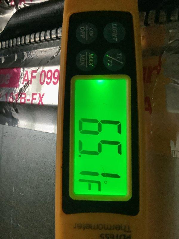 Completed routine AC tune-up on central air conditioning system. Performed standard maintenance procedures including temperature differential testing, which showed proper system operation with supply air temperature of 59.7°F and appropriate temperature split of 26°F across the evaporator coil. All components inspected and found functioning within normal parameters, with no repairs needed at this time.