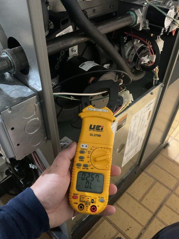 Completed comprehensive ComfortGuard preventive maintenance inspection on residential HVAC system. Performed electrical diagnostics using digital multimeter to verify system amperage, voltage readings, and blower motor performance, confirming all components operating within manufacturer specifications. Inspected interior components including blower assembly, wiring harnesses, ductwork connections, and mechanical assemblies for proper operation and signs of wear.