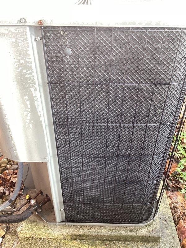 Completed scheduled AC tune-up and preventive maintenance on 19-year-old Lennox outdoor condensing unit. System was operational upon arrival. Performed comprehensive inspection of cylindrical outdoor unit, including examination of protective mesh casing, mounting hardware, and electrical connections. Cleared accumulated leaves and debris from base of unit and surrounding area to ensure proper airflow and drainage. Verified all mechanical components, refrigerant levels, and electrical connections were functioning within normal operating parameters.