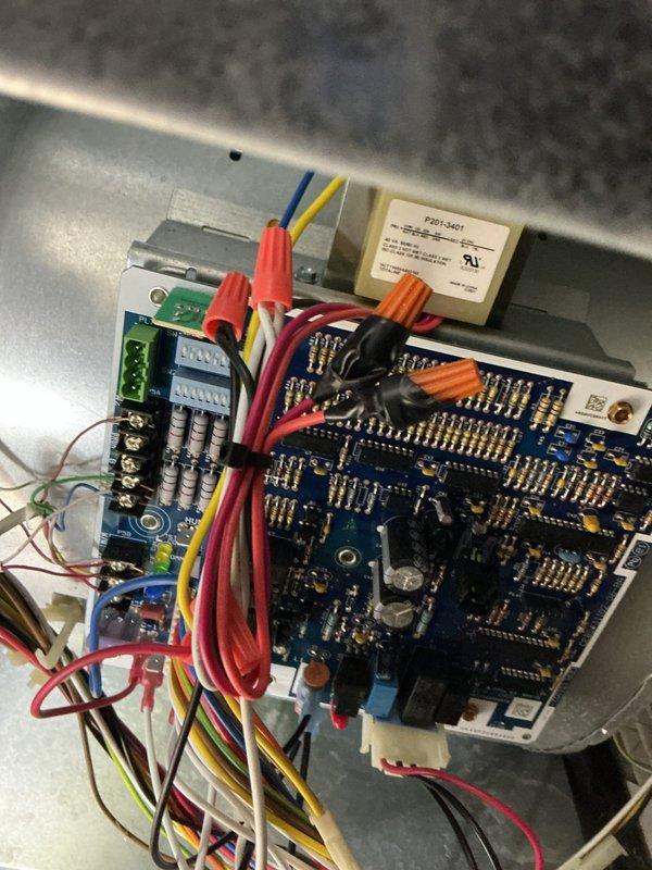 Performed routine preventative maintenance on residential central air conditioning system. Conducted comprehensive tune-up inspection including visual assessment of furnace unit, ductwork connections, condensate drainage system, and electrical control board components. Verified proper operation of all system controls and wiring connections. Adjusted air filter housing insertion point per customer request to improve accessibility. Confirmed unit warranty coverage status with customer. System operating within normal parameters with no deficiencies noted. Documented equipment condition through photographic records showing mechanical room installation and internal control panel assembly.