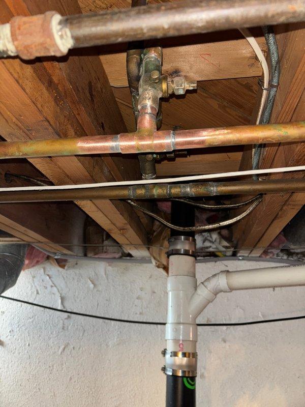 Installed a new 50-gallon tanked water heater in accordance with mechanical permit requirements. Completed all necessary plumbing connections, including copper and PVC pipe integration with existing infrastructure, ensuring proper fitting assembly and secure connections throughout the installation. All required permits were obtained prior to installation, and job site documentation including photographic records was completed per standard protocol.