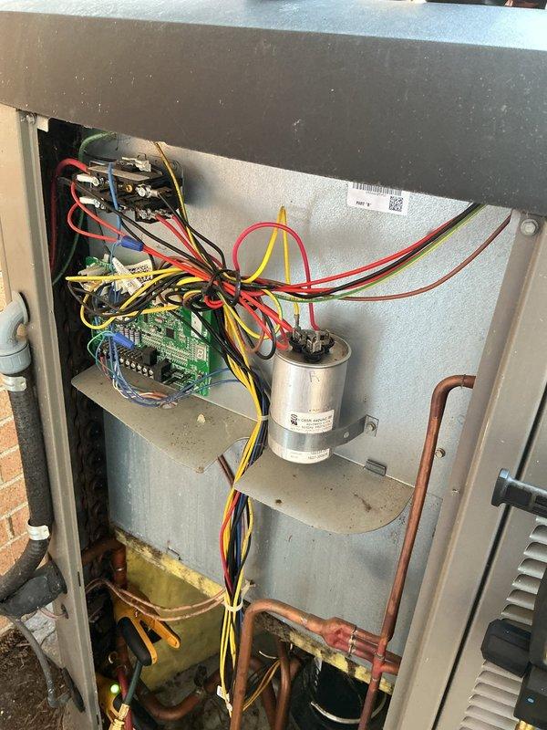 Completed annual cooling maintenance on Lennox system. Inspected and photographed thermostat operation, verified control board functionality, checked electrical connections and capacitor condition, and documented all major components. Filter replacement required and noted for service.