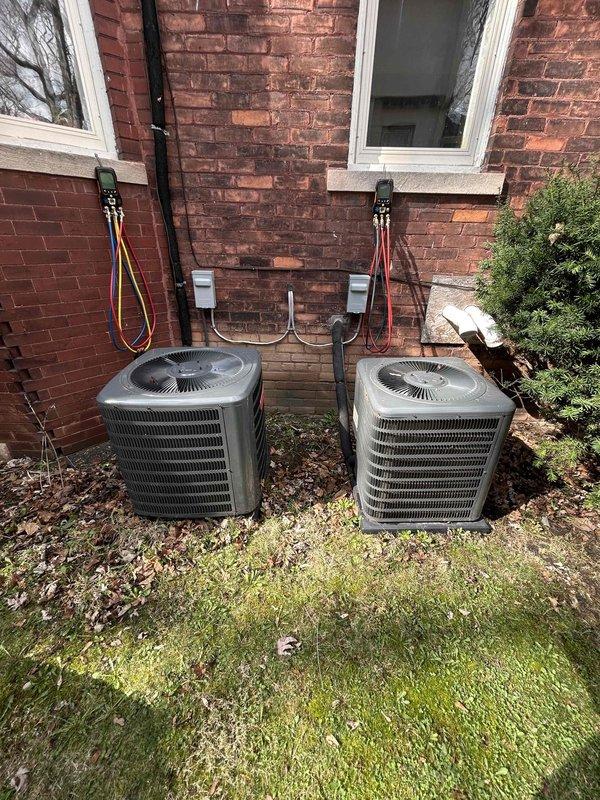 Completed annual maintenance on first of two outdoor condensing units at multi-unit residential property. Performed comprehensive system inspection including refrigerant pressure and temperature diagnostics using digital manifold gauges, recording superheat and subcooling values within manufacturer specifications. Cleaned condenser coils, inspected electrical connections and disconnect panel, verified proper fan operation, and documented system performance metrics for maintenance records.
