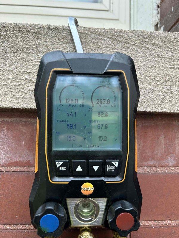 Completed second of two annual cooling maintenance visits at multi-unit residential property. Performed comprehensive ACM on dual outdoor condenser units, including system diagnostics with digital manifold gauges measuring refrigerant pressures, temperatures, and superheat/subcooling values across both systems. All operational parameters recorded and found within manufacturer specifications, with both units operating efficiently and ready for upcoming cooling season.