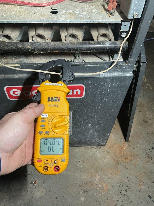 Completed annual furnace and air conditioning maintenance tune-up on residential Goodman HVAC system. Performed comprehensive inspection of gas furnace including blower motor assembly, heat exchanger, burner assembly, ignition components, and control board. Measured and verified electrical amperage draw at 0.40A using clamp meter to ensure proper motor operation. Inspected all electrical connections, gas manifold, and internal components for proper function and safety. System operating within normal parameters upon completion of maintenance procedures.
