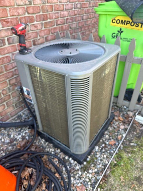 Completed annual cooling maintenance on residential air conditioning system. Performed thorough inspection of outdoor condenser unit, replaced air filter, and verified proper system operation. All refrigerant lines, electrical connections, and components found to be in good working condition with no issues identified.