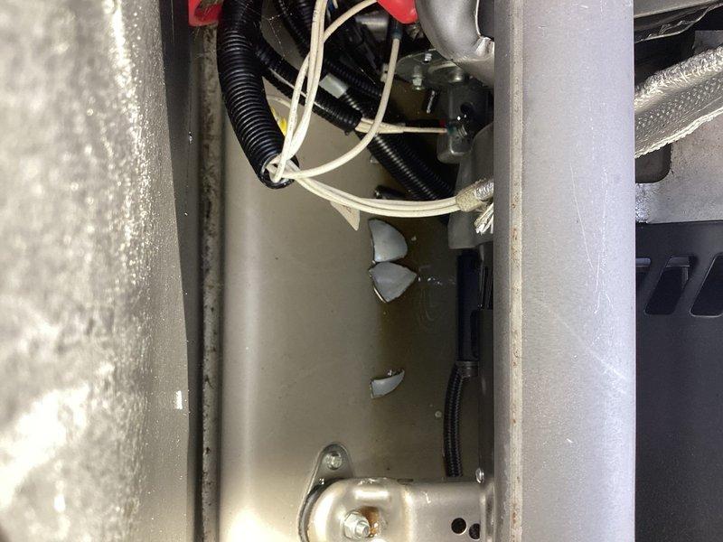 Responded to callback for Kohler 20KW generator that had been displaying "unexpected issue" error message and failing to start for approximately one month, including failure to activate during a recent power outage. Upon arrival, performed diagnostic inspection of generator control system and internal components. Identified issue related to startup sequence failure that had persisted following previous service visit by another electrician. Accessed generator control compartment and inspected wiring connections, control board interfaces, and safety interlocks. Examined fuel delivery system components, including hoses, fittings, and pressure regulation hardware visible in service compartment. Verified all electrical connections were secure and properly terminated. Tested generator startup sequence and monitored system response to identify root cause of failure. Cleared error codes from control panel and performed operational verification to confirm proper startup functionality restored.