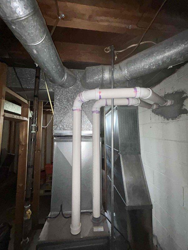 Conducted comprehensive assessment of non-operational basement HVAC system with 9-year-old equipment including Guardian furnace and air conditioning unit. Evaluated existing ductwork configuration, PVC venting system, and overall mechanical installation to provide complete replacement estimate for natural gas heating and cooling system. Documented current equipment conditions and spatial requirements, prepared detailed written proposal for full system replacement per customer request.