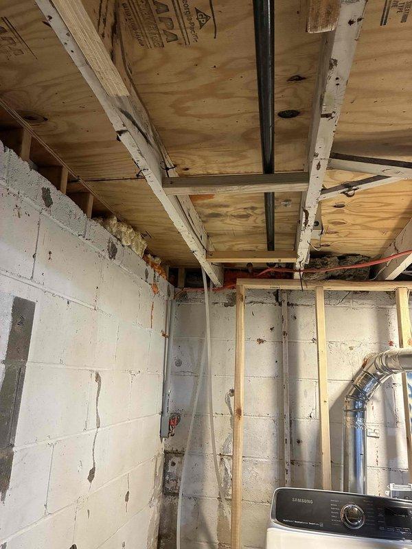 Relocated existing gas line to accommodate installation of new tankless water heater in basement utility area. Rerouted gas piping through exposed ceiling joists, utilizing flexible gas line (CSST) to provide proper clearance and positioning for tankless unit mounting location. Ensured all gas line connections meet code requirements and verified system integrity upon completion.