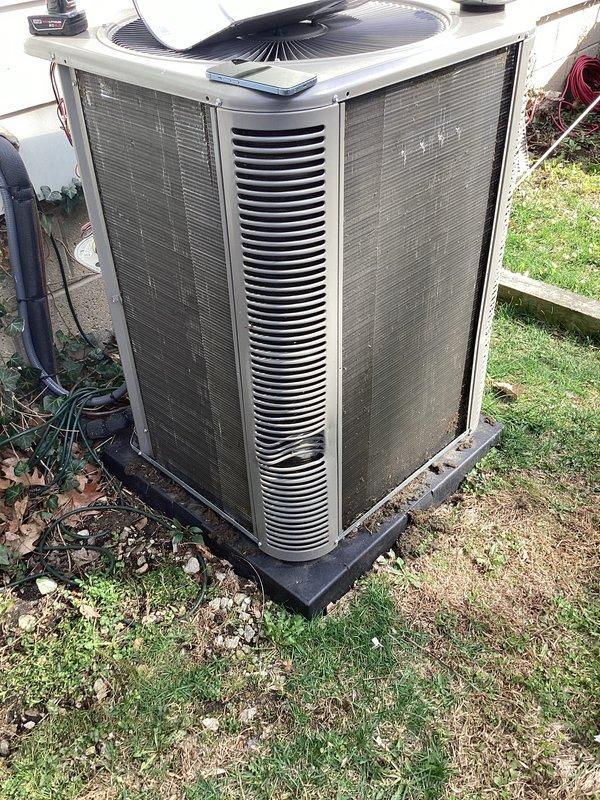 Completed routine Air Care Cooling maintenance on residential Bryant AC condensing unit. Upon arrival, found condenser coils heavily clogged with dirt, dust, and debris causing restricted airflow. Thoroughly cleaned and washed condenser coils to restore proper heat transfer efficiency. Inspected fan assembly, electrical connections, and refrigerant lines. Unit operational and running efficiently upon completion.