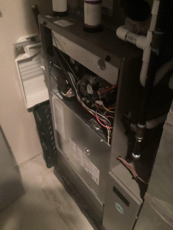 Completed routine AHC maintenance inspection on residential HVAC system. Performed visual inspection of evaporator coil, which showed clean condition with no debris accumulation or fin damage, and verified refrigerant lines and condensate drain tube are properly secured and functioning. Inspected furnace unit interior components, confirmed all electrical connections are secure, and verified system accessibility and overall operational readiness.
