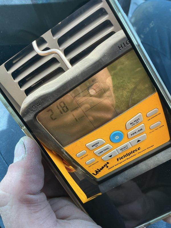 Completed full HVAC system installation including 70,000 BTU furnace and 2-ton air conditioning unit with rear discharge configuration. Obtained mechanical and electrical permits, installed Lennox condenser unit on exterior concrete pad with proper electrical disconnect and conduit connections, and reconnected all system components. Verified system operation with diagnostic measurements showing proper refrigerant charge and airflow parameters.