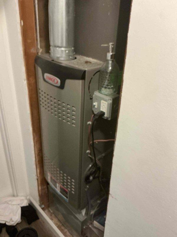 Completed complimentary annual heating maintenance on 10-year-old Lennox gas furnace per membership agreement. Performed comprehensive tune-up inspection, checked all system components, gas connections, and pressure relief valve operation. Removed and replaced heavily soiled air filter showing significant dust and particulate accumulation. Verified proper furnace operation and documented equipment condition with photos.