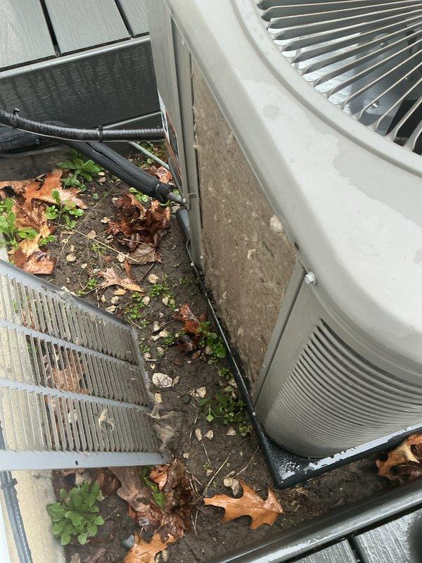 Completed annual cooling maintenance on residential HVAC system. Performed comprehensive inspection of outdoor condenser unit, which showed significant accumulation of leaves, debris, and vegetation growth on surrounding platform area. Cleaned condenser coils and surrounding area to restore proper airflow and system efficiency. Replaced 20x25x5 furnace filter (X6673) inside the home. Inspected all electrical connections, refrigerant lines, and mechanical components for proper operation. Verified system functionality and confirmed unit is operating within manufacturer specifications for the cooling season.