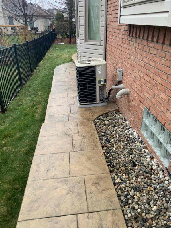 Completed full system estimate for 2200 square foot ranch home with basement featuring 23-year-old Lennox HVAC equipment from 2003. Assessed furnace at end of serviceable life with significant wear, while air conditioning unit remains operational. Documented existing system configuration including exterior venting, condenser placement, and hot water tank with leaking top connections, then provided comprehensive replacement options for complete HVAC system upgrade.