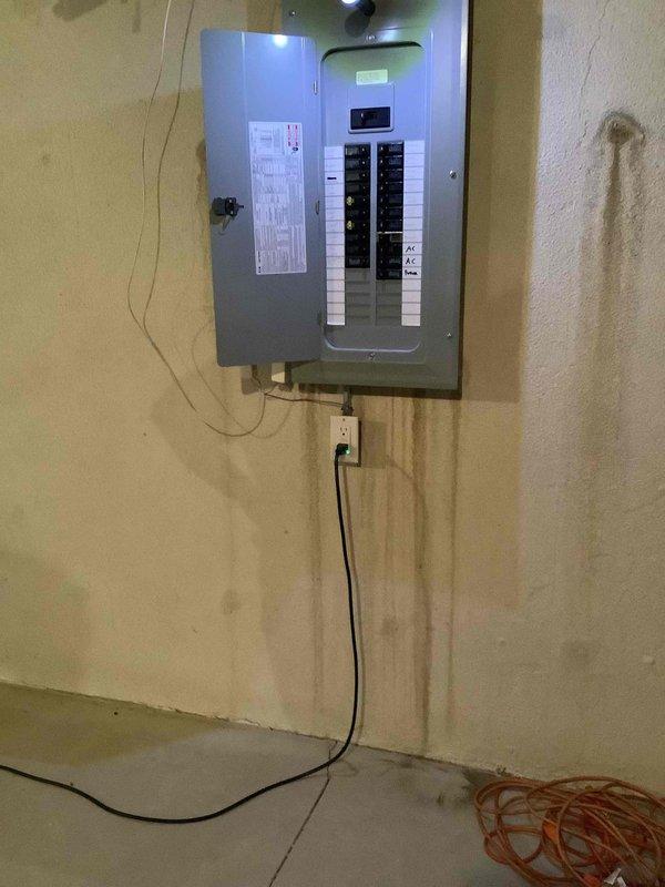 Conducted site evaluation and provided free estimate for Generac whole-house generator installation at approximately 20-year-old residence with no existing generator system. Assessed existing 200-amp electrical service panel, documented current electrical infrastructure including circuit breaker configuration and available capacity, and photographed panel location in basement utility area to determine optimal transfer switch placement and load requirements for generator integration.