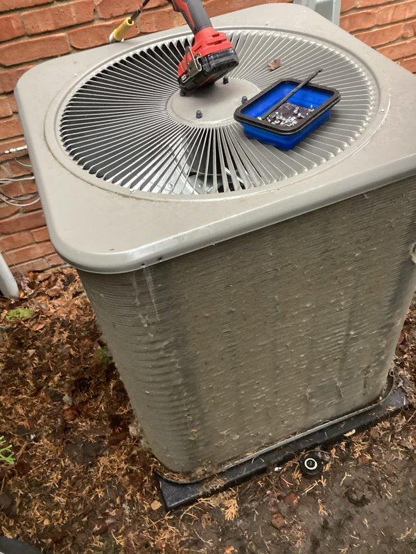 Completed annual cooling maintenance on outdoor condensing unit. Performed comprehensive system inspection, cleaned condenser coil and exterior surfaces, tested electrical components with multimeter to verify proper voltage and amperage readings, and confirmed operational efficiency of all mechanical systems.