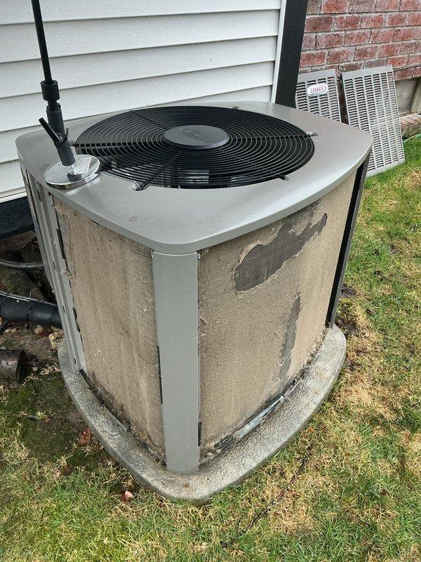 Completed scheduled maintenance on two residential air conditioning condenser units. Performed comprehensive inspection of both outdoor units, which showed significant weathering and exterior discoloration consistent with extended outdoor exposure. Verified operational status of fan assemblies, inspected refrigerant line connections, and assessed overall system condition. Both units were found to be structurally intact and functioning properly despite cosmetic weathering on exterior panels and concrete pads showing accumulated debris and algae growth.