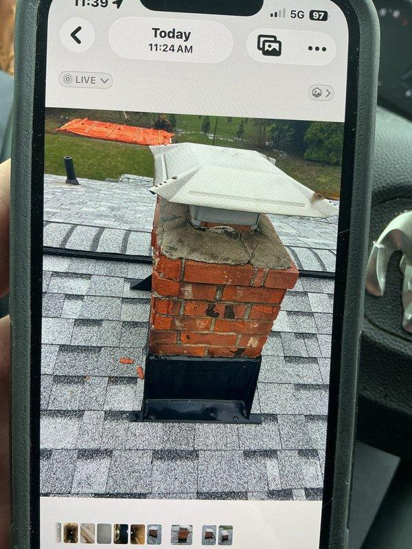 Responded to callback for reported water leak following recent HVAC installation. Upon arrival, conducted thorough inspection of exterior components and roof penetrations. Investigation revealed leak source at chimney chase cover and flashing interface where condensate line routing intersected with existing structure. Documented conditions with photographic evidence showing chimney cap, brick chimney construction, and roof shingle interface points. Identified compromised seal at metal chase cover allowing water intrusion during recent weather events. Coordinated findings with field supervisor for resolution planning and customer communication regarding necessary corrective measures to address leak source and prevent future water damage.