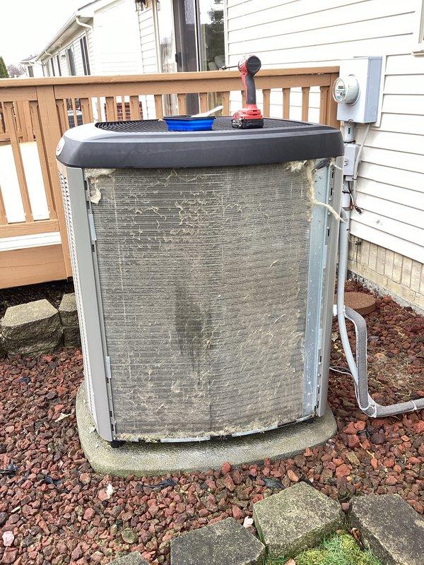 Completed scheduled maintenance on residential air conditioning system. Upon arrival, noted outdoor condenser unit showed significant accumulation of dirt and debris on coil fins, which was restricting airflow. Performed thorough inspection of equipment, connected refrigerant manifold gauges to measure system pressures and temperatures. Recorded operating pressures of 116.6 PSIG with superheat and subcooling readings to verify proper refrigerant charge and system performance. All measurements indicated unit was operating within manufacturer specifications following maintenance procedures.