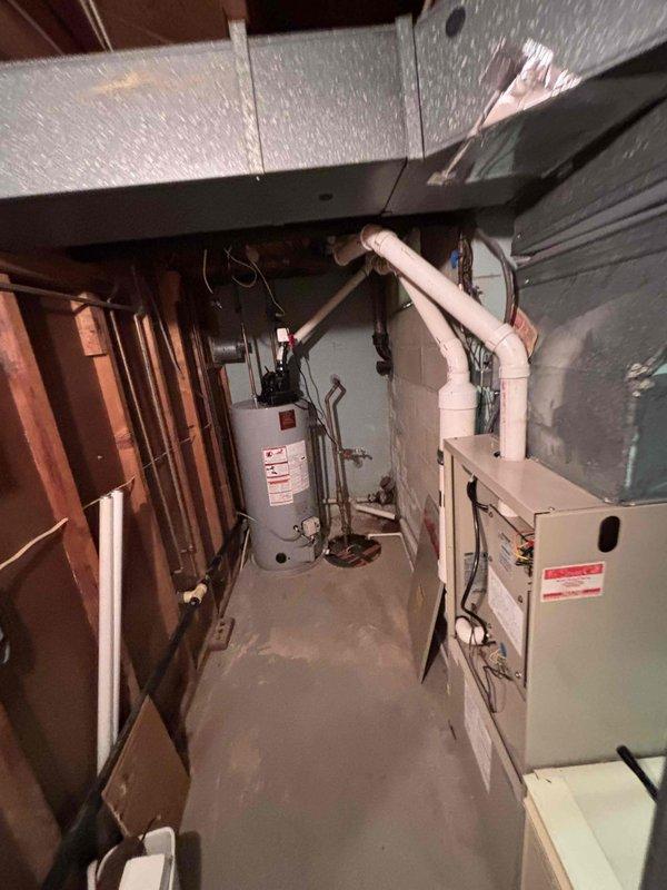 Provided comprehensive estimate for complete furnace and air conditioning system replacement in basement location. Existing 30-year-old HVAC equipment currently operational but has exceeded expected service life. Assessment included evaluation of basement mechanical room configuration with existing furnace, water heater, ductwork infrastructure, and associated electrical systems to determine proper equipment sizing and installation requirements for new high-efficiency heating and cooling system.