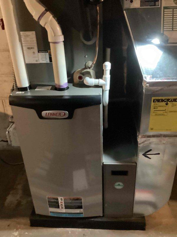 Completed spring maintenance tune-up on a 4-year-old Lennox residential air conditioning system. Performed comprehensive inspection of all major components including inducer motor, gas valve assembly, electrical connections, condensate drainage system, and PVC venting. All systems tested and found operating within normal parameters with no repairs required.