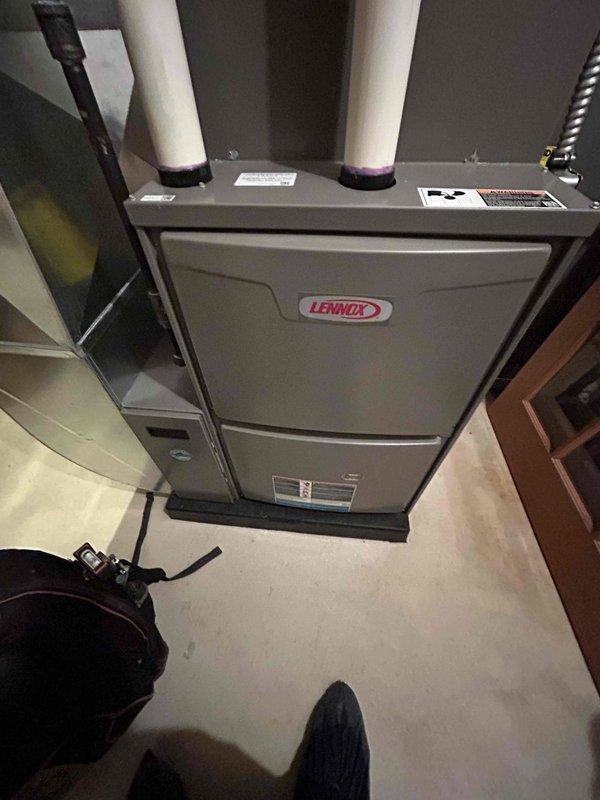 Completed comprehensive 5-year ComfortGuard maintenance service on residential HVAC system including Lennox furnace and outdoor condensing unit. Performed full system inspection, replaced air filters, cleaned components, verified proper operation of both heating and cooling equipment, and confirmed all safety controls and ventilation systems functioning within manufacturer specifications.