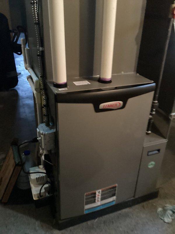 Completed annual HVAC maintenance on Lennox furnace system. Inspected blower motor, belt drive assembly, gas valve connections, and heat exchanger components; all found in operational condition. Humidifier pads require replacement and customer has been notified of this maintenance need.